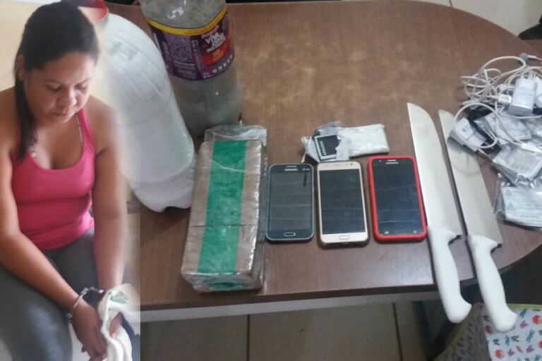 Agentes prende mulher tentando entrar no presídio com mais de 1kg de droga, celulares e carregadores